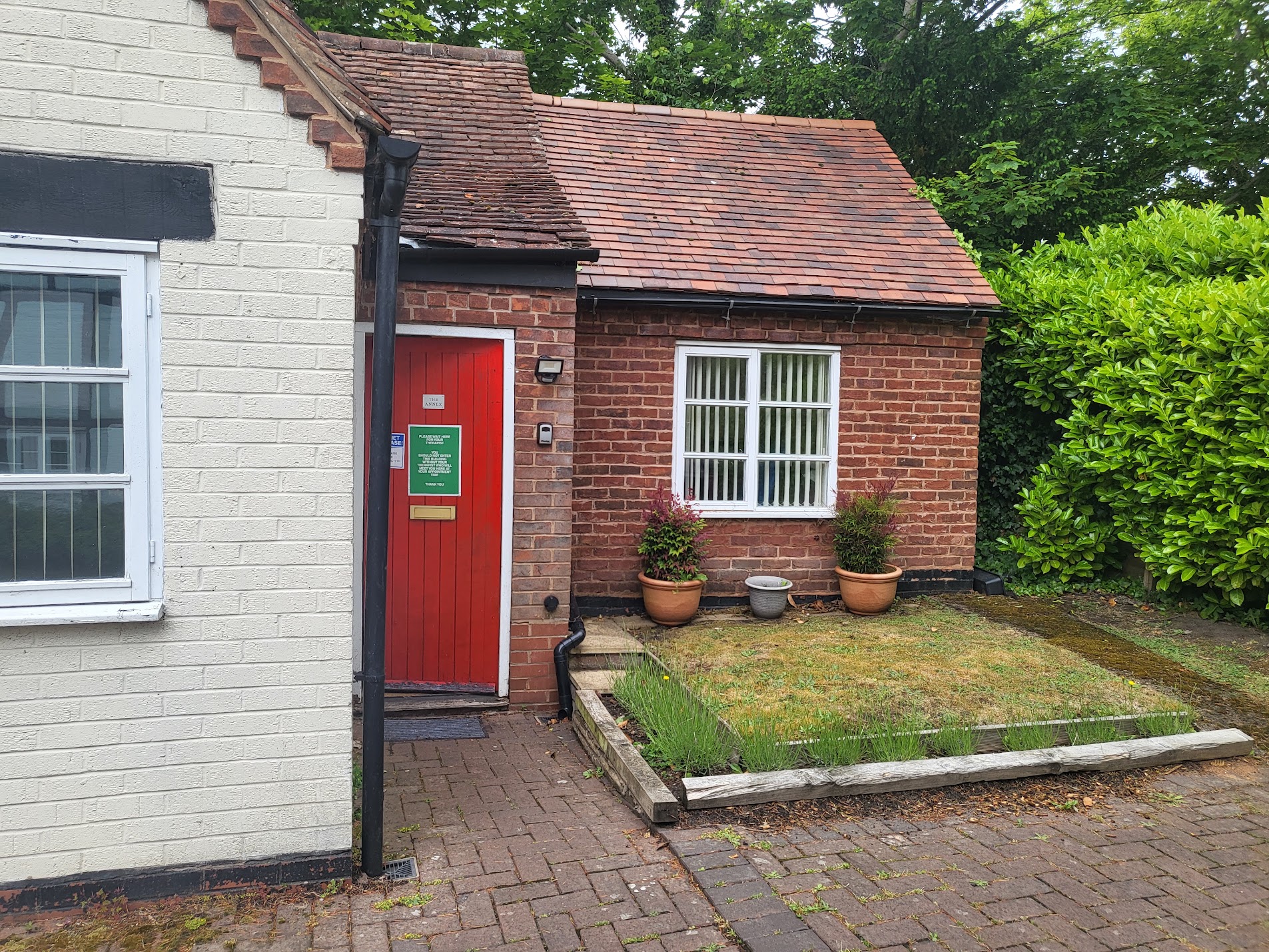 Storefront of an ear wax removal clinic in Solihull.