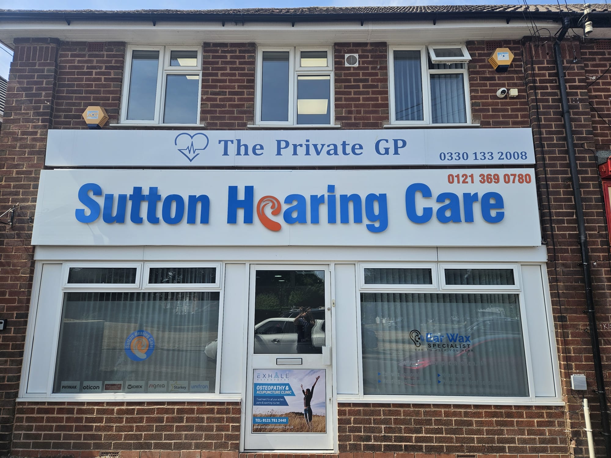 Storefront of an ear wax removal clinic in Sutton.
